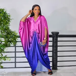 Detail of fuchsia gradient African bubu dress with rhinestone waist buckle