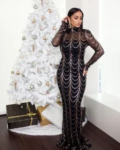 Elegantes schwarzes langärmeliges Meerjungfrau-Abendkleid mit goldenen Pailletten