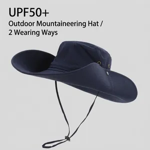 Wide brim navy blue hiking hat showing durable fabric and an adjustable chin strap.