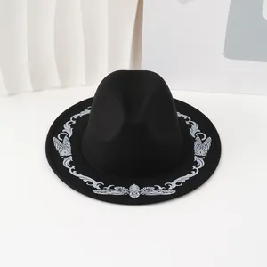 Vintage black Western cowboy hat with silver butterfly embroidery patterns for travel