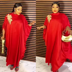 Elegant African style red kaftan maxi dress with batwing sleeves and gold lace applique