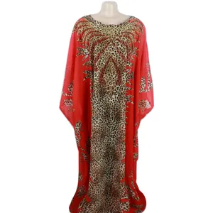 Detailed view of African chiffon kaftan dress featuring leopard print and sequin rhinestones