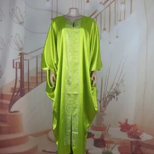 Elegant plus-size lime green African kaftan dress featuring a detailed Greek key pattern