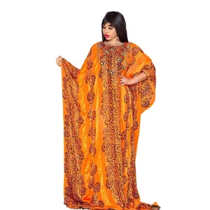 Elegant orange African kaftan maxi dress with floral print and rhinestone bead accents
