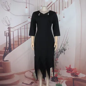Elegant black midi dress featuring three-quarter sleeves and decorative tassel fringe hem.