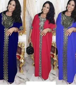 African style maxi dresses with ornate gold embroidery available in three vibrant colors