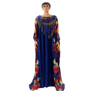 Full-length view of blue African kaftan dress with red rose floral print and rhinestones