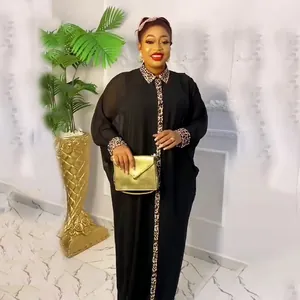 Elegant black African Abaya dress with leopard print trim and rhinestone details