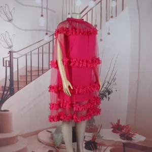 Detailed view of vibrant pink petal mesh puffy dress for dance and performance events