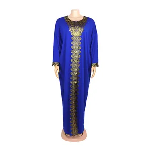 Royal blue African style long dress with intricate gold embroidery detail on mannequin