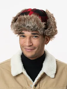 Detail showing the red plaid trapper hat with faux fur and ear flaps on a male model