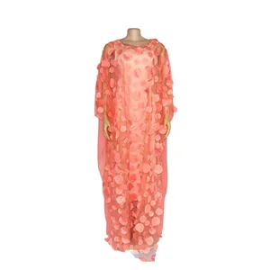 Detailed view of pink African maxi dress featuring intricate 3D floral petal appliques