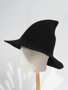 Detailed view of a minimalist black pointed witch hat for Halloween cosplay parties