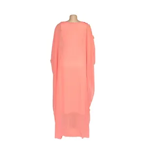 Back view of elegant coral pink African plus size long dress in sheer flowing chiffon fabric.