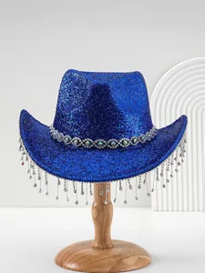 Close-up detail of vibrant blue glitter cowboy hat featuring sparkling rhinestone fringe