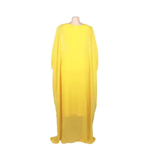 Détail de la robe longue africaine jaune avec broderie 3D et débardeur intérieur assorti