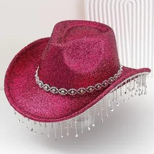 Sparkly magenta cowboy hat with rhinestone tassels for party