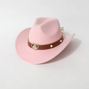 Stylish pink wool felt cowboy hat for women featuring heart rhinestone buckle and pearls