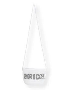Close-up of a white woven bridal crossbody bag with rhinestone BRIDE lettering detail