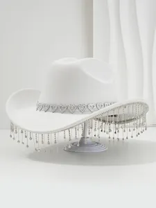 Elegant white cowboy hat featuring heart crystal band and sparkly rhinestone tassels