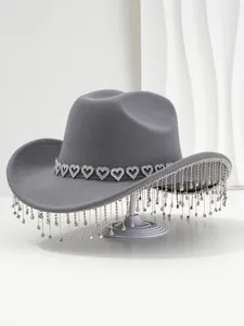 Detailed view of gray cowboy hat featuring heart-shaped rhinestones and dangling fringe