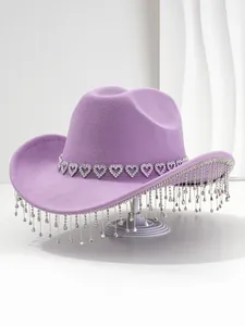 Elegant purple cowboy hat featuring sparkling rhinestone heart trim and crystal tassels