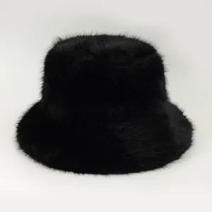 Premium black faux fur bucket hat featuring dense soft plush texture for winter warmth