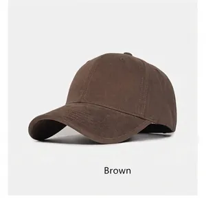 Classic brown hard-top baseball cap featuring an adjustable strap and curved brim detail
