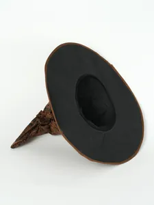 Detail of vintage brown wizard hat with cracked leather texture for Halloween cosplay.