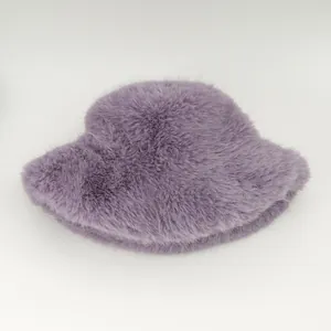 Detailed macro view of the soft purple plush texture on a stylish bucket hat for women.
