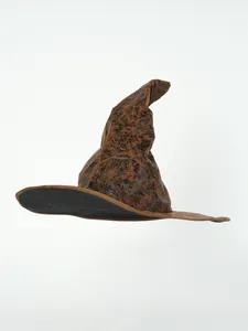 Detail shot of the vintage brown leather-texture wizard hat for Halloween cosplay
