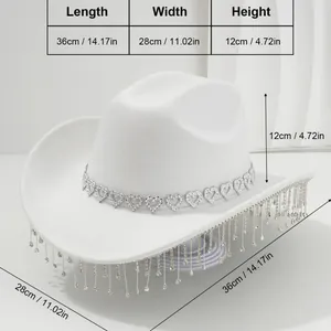 Elegant white cowboy hat for women featuring heart rhinestone band and crystal fringe