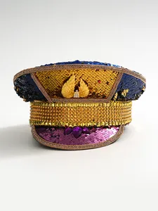 Detailed view of Y2K sequin stage hat with golden wings and purple gems for rave parties