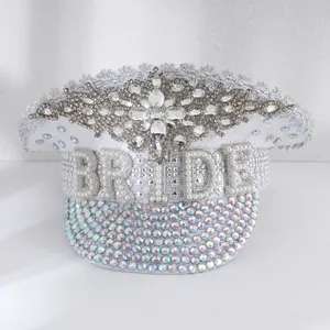 Elegant white captain hat featuring pearl BRIDE lettering and intricate rhinestone crystal detailing