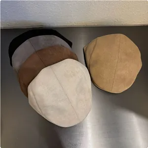 Detailed view of premium suede retro flat caps available in five earthy neutral colors