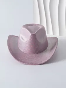 Detailed macro view of the pink metallic mesh texture on a stylish women's cowboy hat