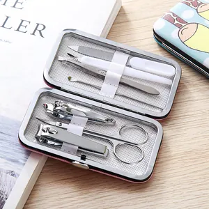 7-piece stainless steel manicure grooming kit in a cute cartoon pattern travel case