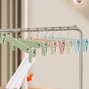 Non-marking pants hangers with strong non-slip clips for skirt and trouser storage