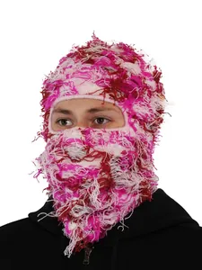 Macro view of pink distressed knitted balaclava ski mask with fuzzy textured finish