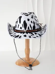 Detailed view of unisex western cowboy hat featuring black and white cow print and bull head.
