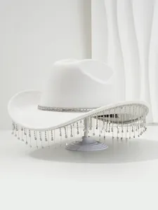 Detailed view of luxury white cowboy hat with sparkling rhinestone fringe and crystal band