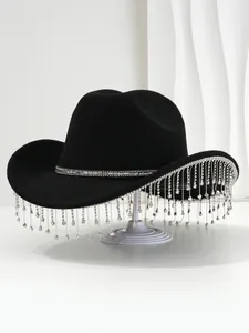 Luxury black cowboy hat with shimmering rhinestone fringe and square crystal band detail.