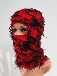Red and black distressed knit balaclava with shaggy texture for winter skiing and outdoors