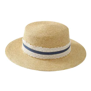 Elegant French raffia straw boater sun hat with white lace and blue ribbon detail