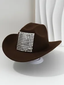 Close-up of brown Western cowboy hat with silver 3D square rivets for party outfits