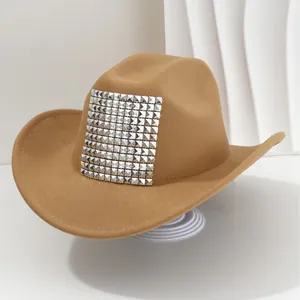 Stylish khaki felt western cowboy hat featuring large silver pyramid stud patch