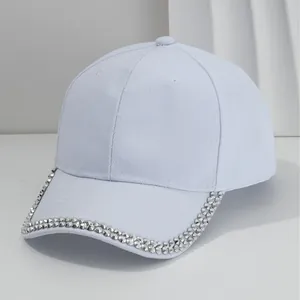 Light blue vintage baseball cap with silver metallic studs on brim for outdoor use.