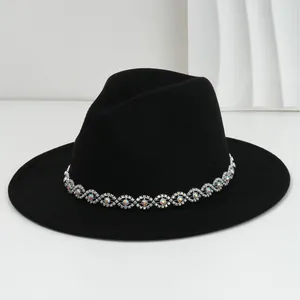 Classic black felt fedora hat featuring a bohemian jeweled band with iridescent gems.
