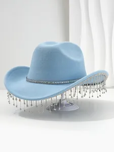Detailed view of a light blue luxury felt hat with elegant sparkling rhinestone fringe