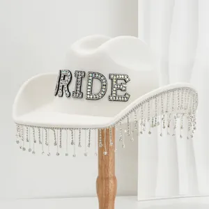 Elegant white wool cowboy hat with rhinestone BRIDE letters and fringe for wedding festivities